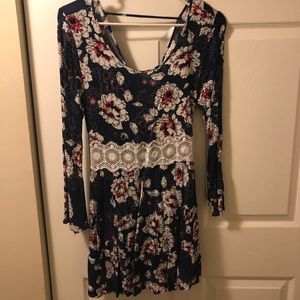 Backless floral mini dress.